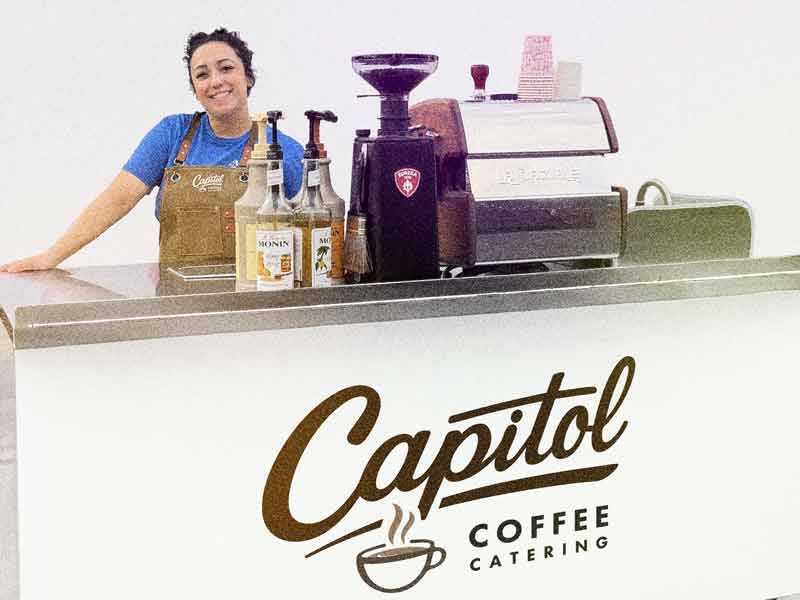 Capitol Coffee Catering cart with a barista