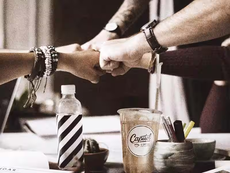 team coffee celebration